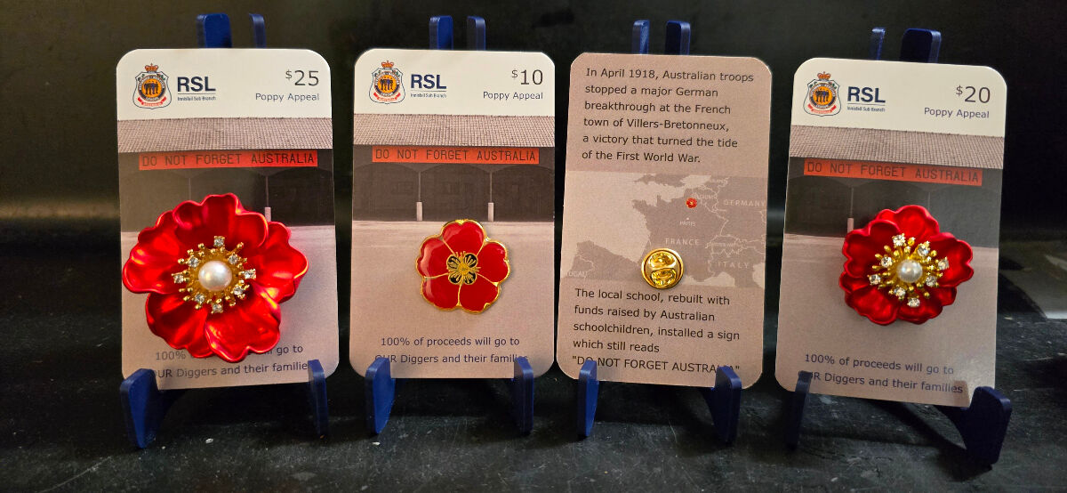 Red Poppy Pins on display cards